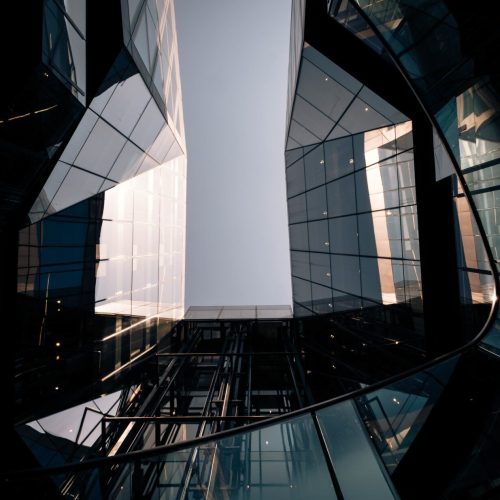 low-angle-shot-of-a-geometrical-design-of-a-building-e1695971044315.jpg